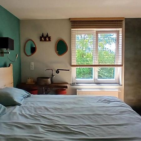 Le Harini Apartment Manhay Bagian luar foto
